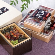 鹿児島産うなぎ、地元の米、独自に開発した手作りのタレで仕上げたうなぎせいろ蒸し弁当（冷凍）〔3個〕