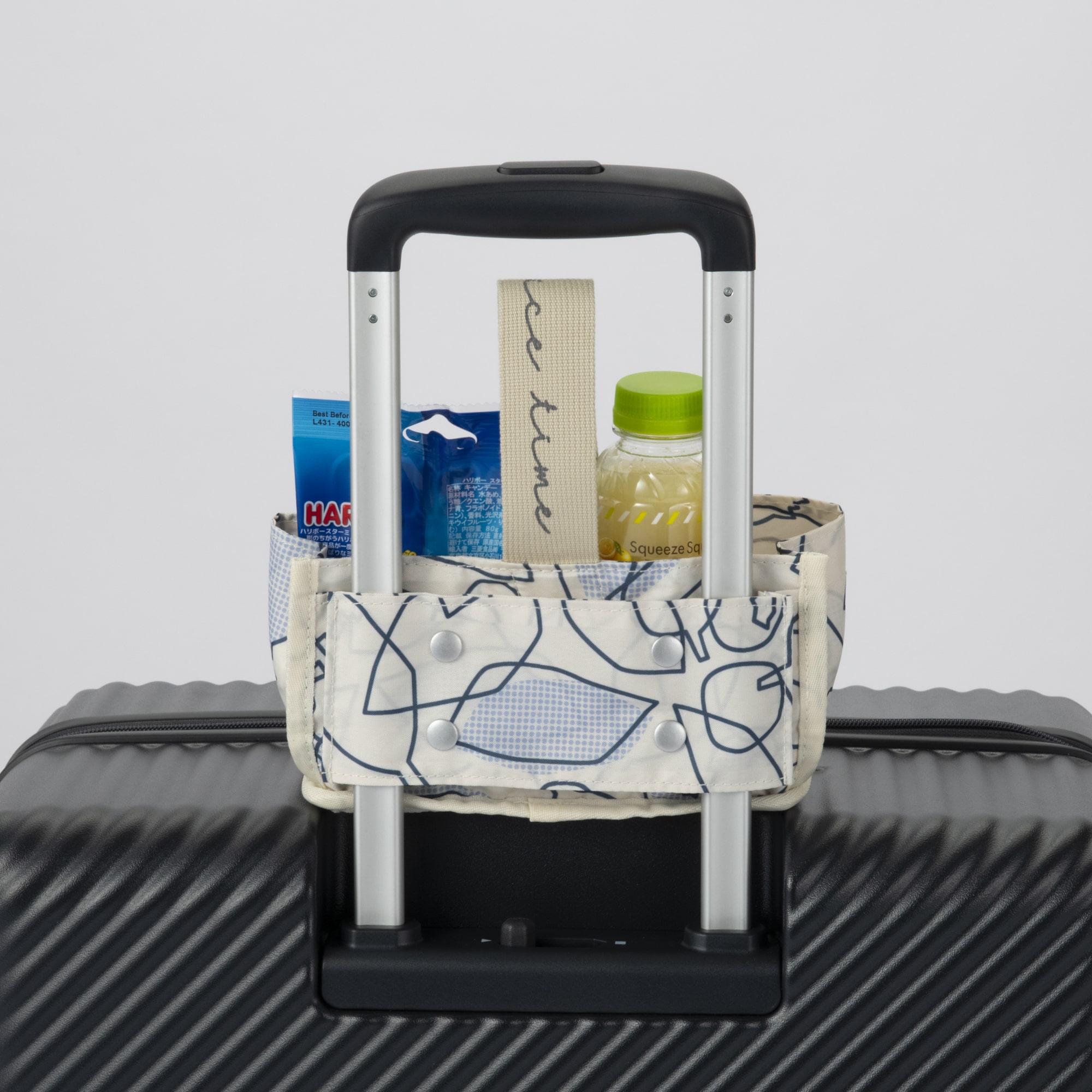 スーツケースのハンドルに取り付け可能