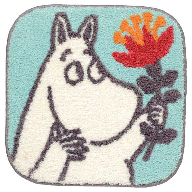 花を持つムーミン